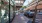 view of colorful retail storefronts and outdoor seating areas in local neighborhood