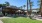 view of colorful retail storefronts and outdoor seating areas in local neighborhood